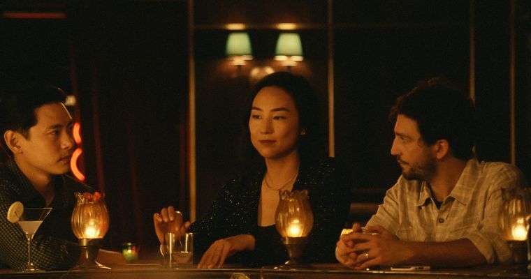 Teo Yoo as Hae Sung, Greta Lee as Nora and John Magaro as Arthur in a scene from 