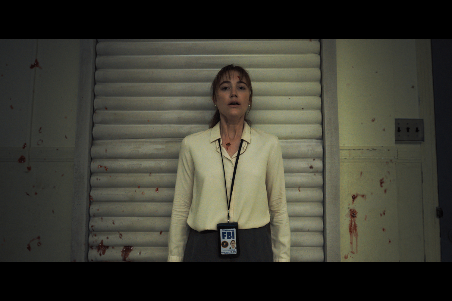 Maika Monroe as Agent Lee Harker in a scene from 