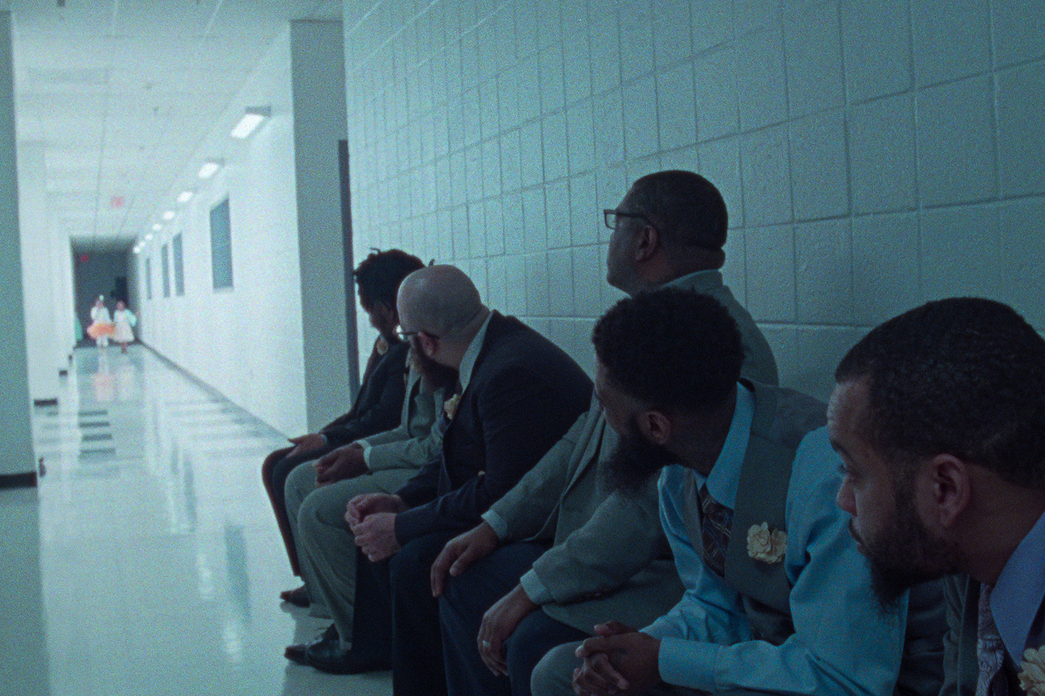 The inmates at a Washington, D.C. jail get a first glimpse of their daughters prior to the father-daughter dance in the documentary 