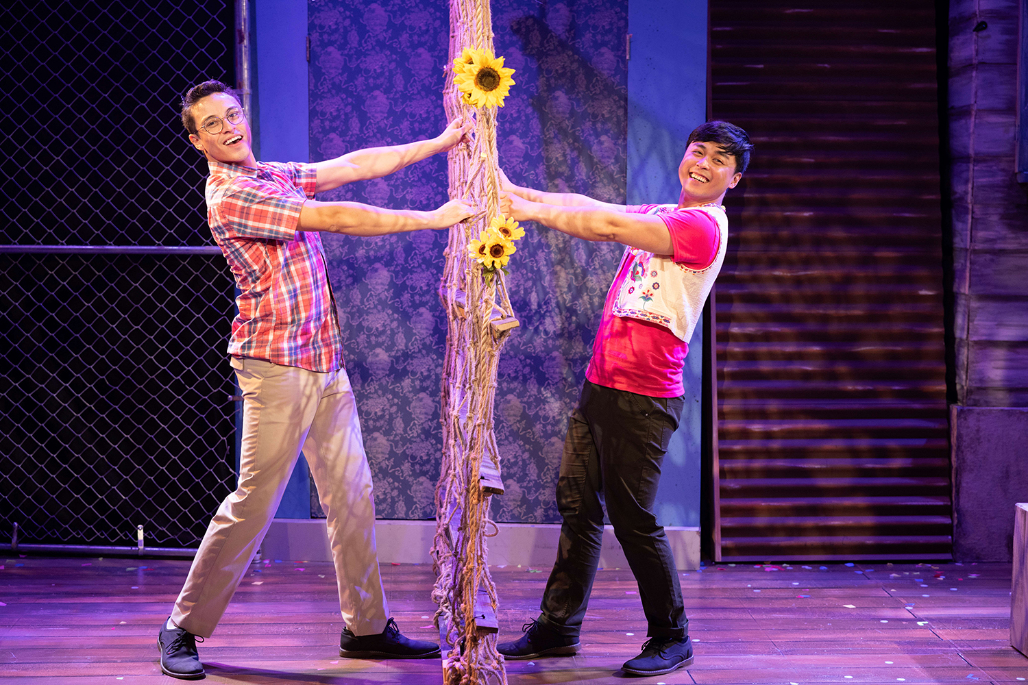 Kevin Hincapie and Jonny Lee Jr. on opposite sides of the wall that separates them but encourages their love. (Photo by Matthew Tippins for Island City Stage)