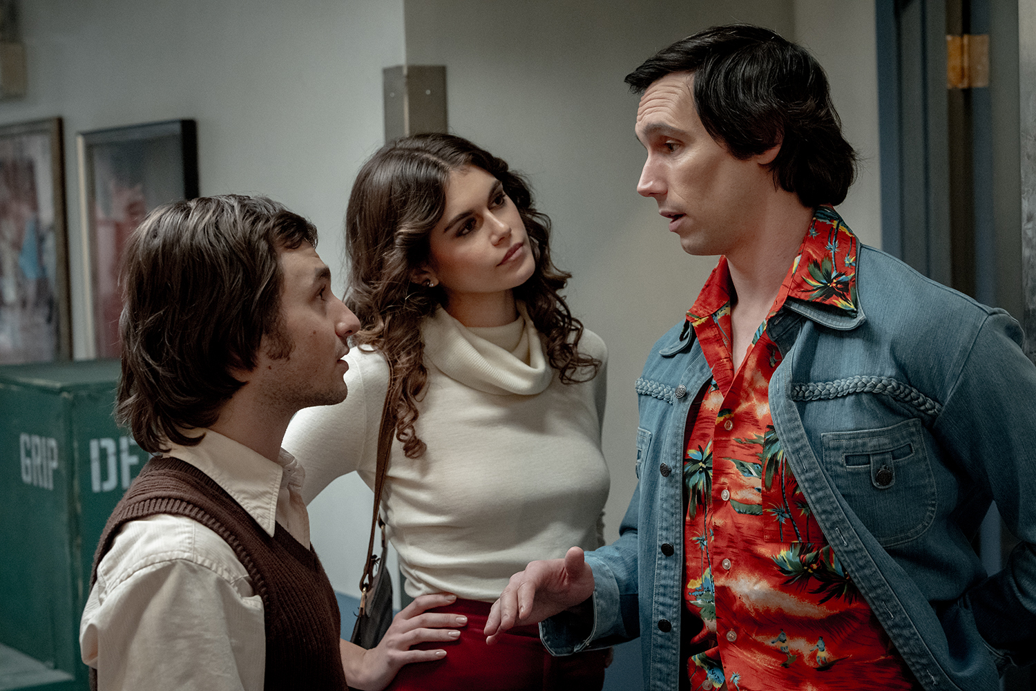 Gabriel LaBelle as Lorne Michaels, Kaia Gerber as Jacqueline Carlin and Cory Michael Smith as Chevy Chase in a scene from 