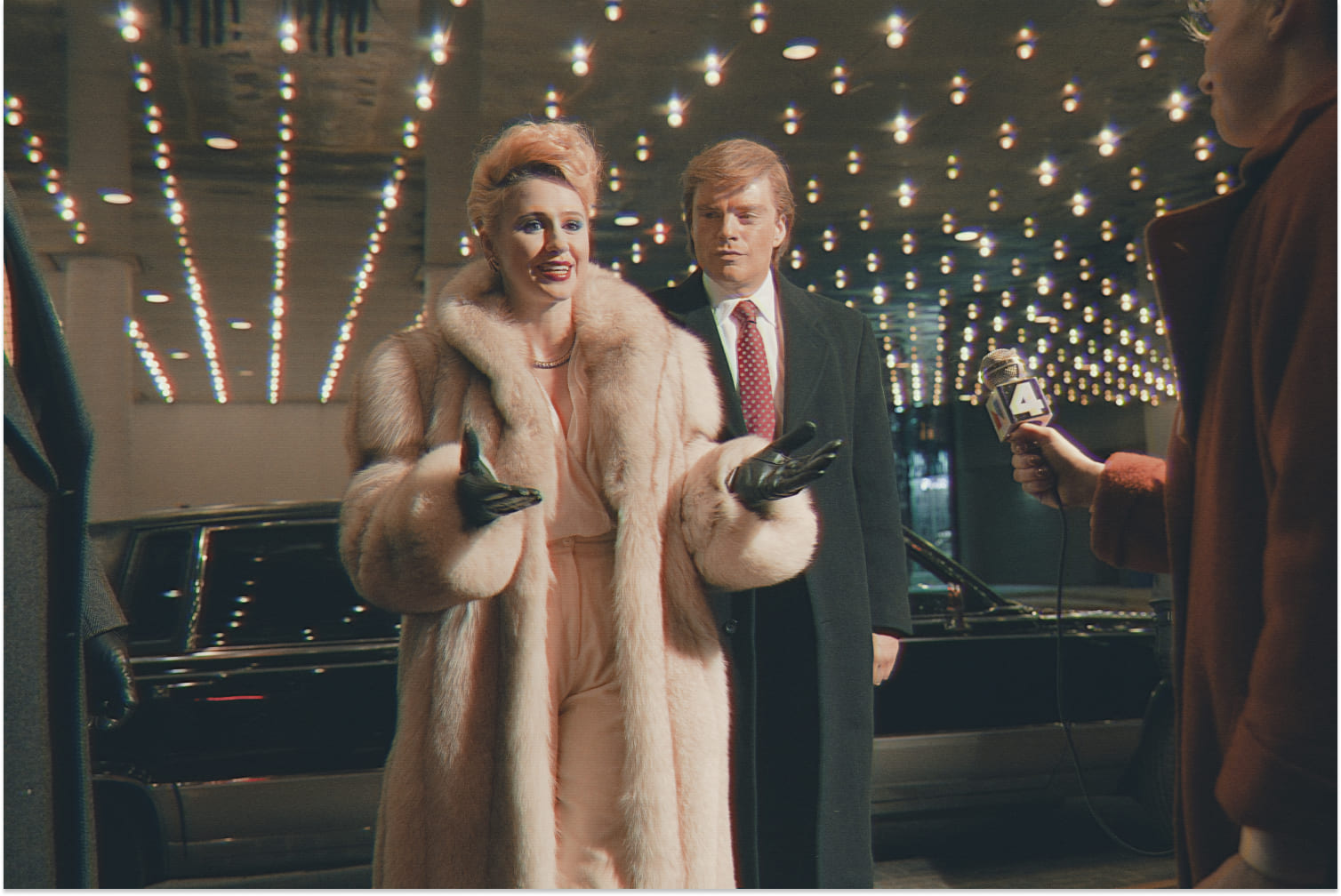 Maria Bakalova (left) as Ivana Trump and Sebastian Stan (right) as Donald Trump in 