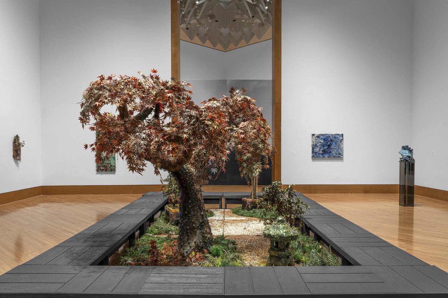 Cristina Lei Rodriguez's work, the interactive sculpture of a Japanese Zen garden, “Endless Autumn,” is in the second gallery. (Photo by Michael Lopez)