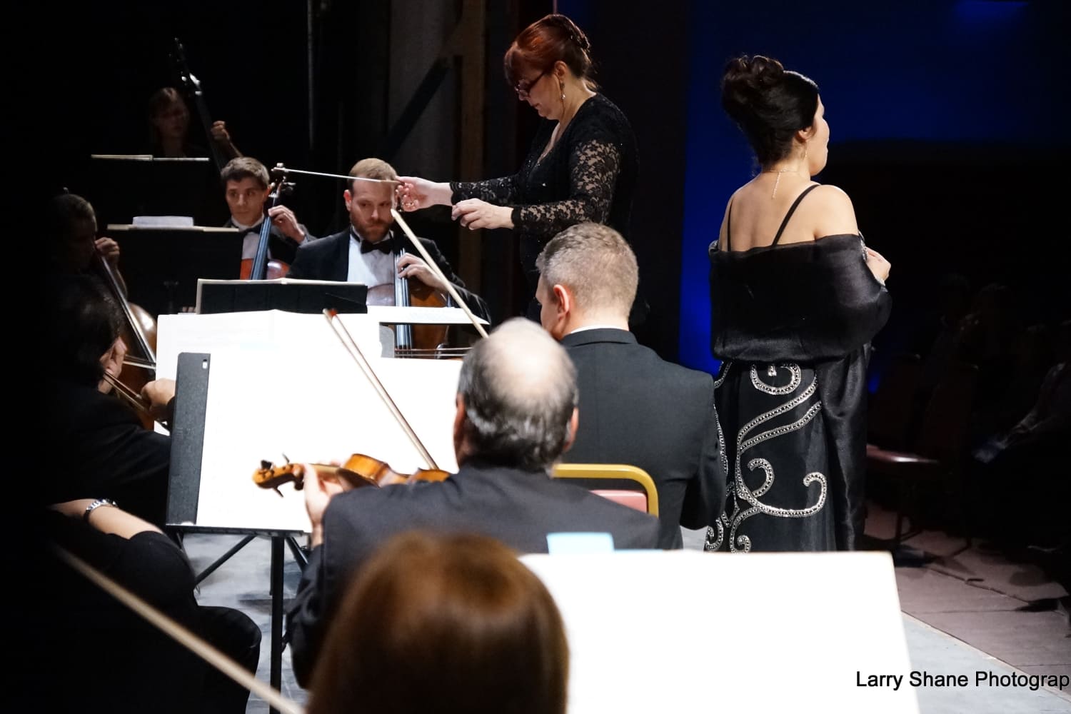 Orchestra Miami Artistic Director and Conductor Elaine Rinaldi with guest soloist Elaine Alvarez (far right) in rehearsal for 