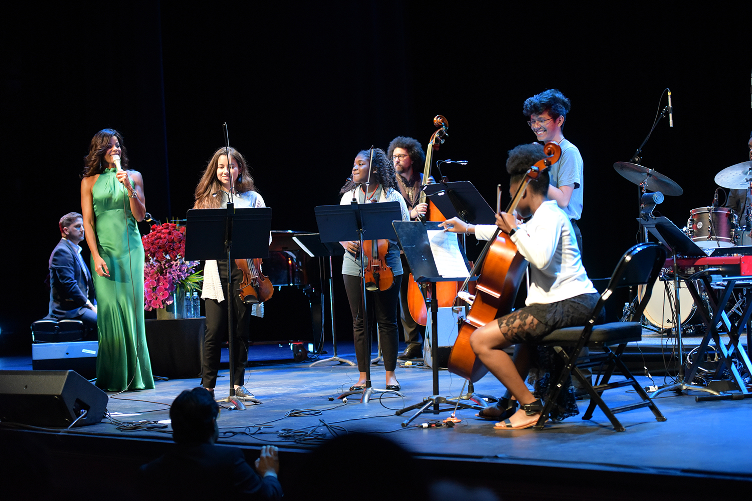 Nicole Henry singing with student musicians from the Miami Music Project. 			(Photos by Sergio at Eyeworks)