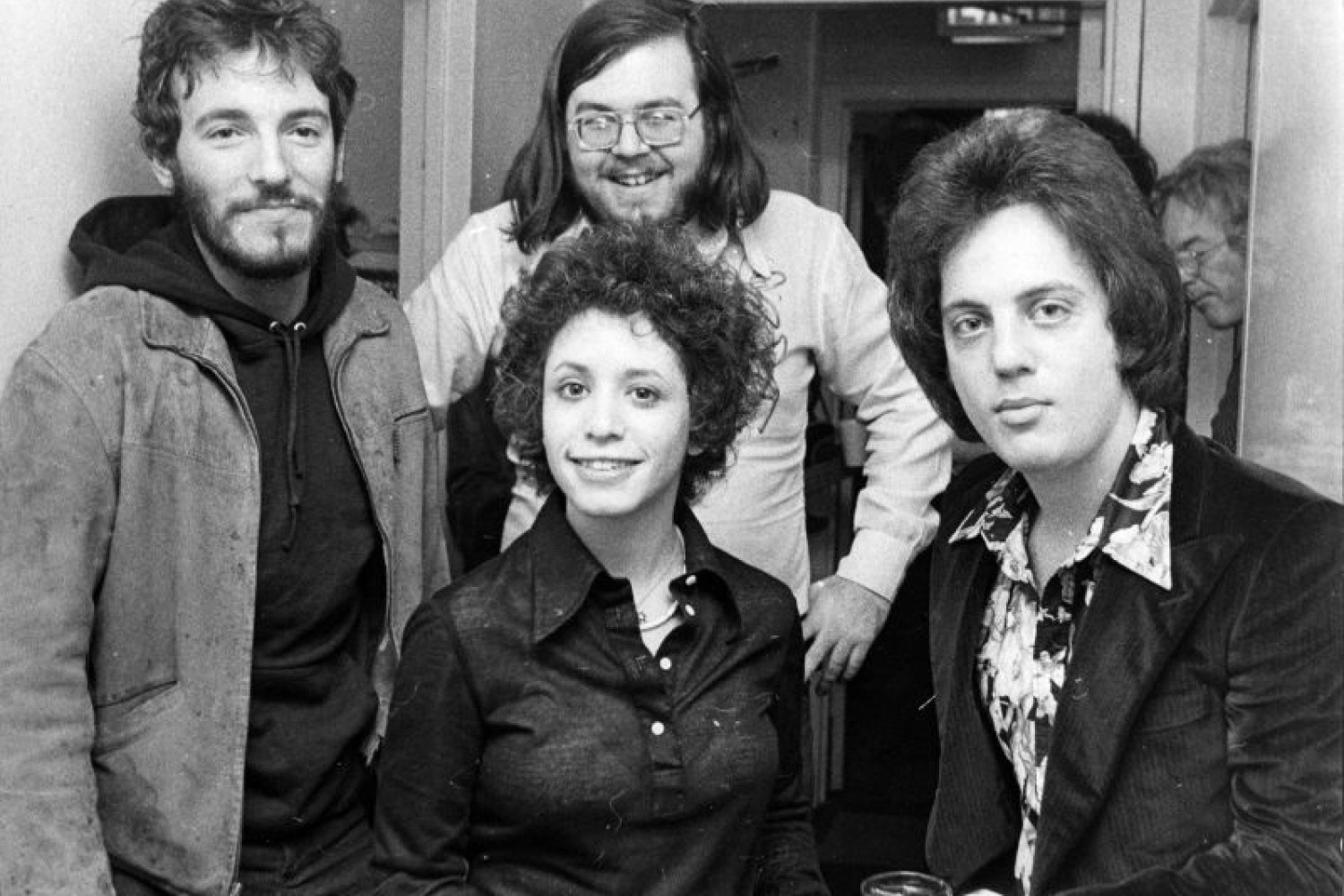 A young Janice Ian in center flanked by Bruce Springsteen on left and Billy Joel on right. Photo by Greenwich Entertainment.