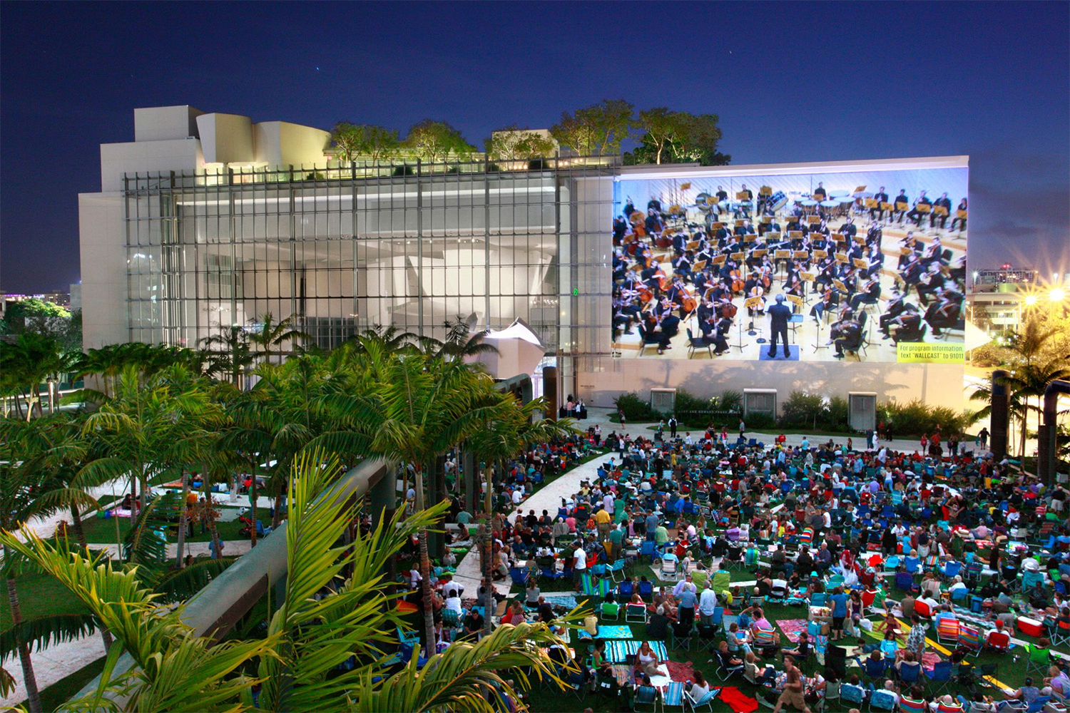 Throughout the 2025-26 season, NWS will present a series of WALLCAST® Concerts in SoundScape Park, where audiences experience live NWS performances through a striking use of visual and audio technology on the soaring, 7,000-square-foot projection wall of the New World Center. (Photo courtesy of NWS)