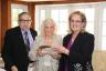 Ron Levitt and Hindi Diamond present award to Betty Lasch, Northeast Miami Women's Club President