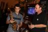 Young musician checks out Kenny G sax.