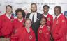 City Year Managing Director of Impact & Service Joe Castaldi, center, & City Year AmeriCorps members & team leaders