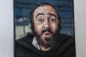 Luciano Pavarotti mosaic on display.